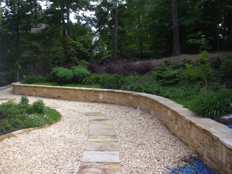 Serpentine low stone seating wall